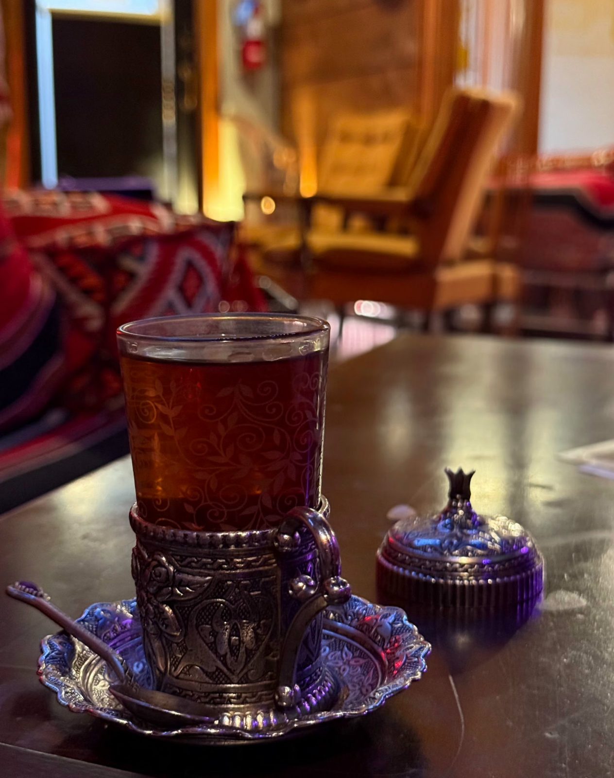 Arabian chai in a decorated glass with a silver holder